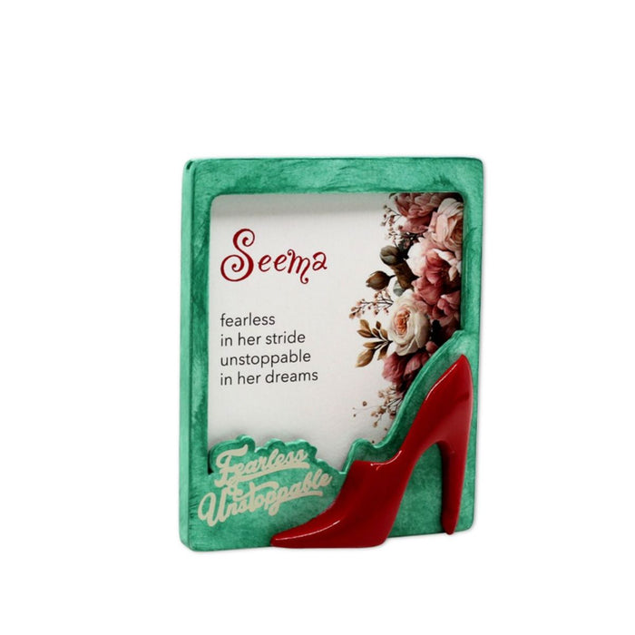 Miniature Red Stiletto on a small picture fridge magnet with the text Fearless and Unstoppable. 